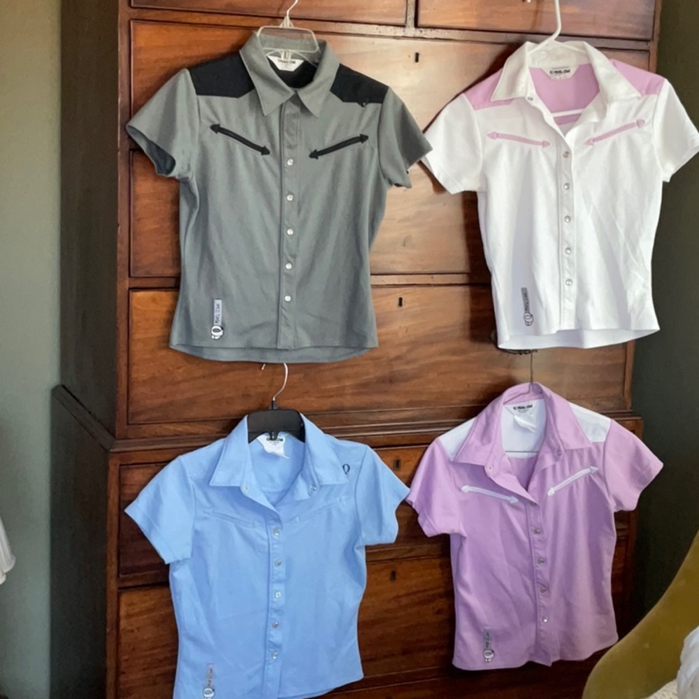 These are sweet Pearl Izumi polyester snap front shirts. Size small.